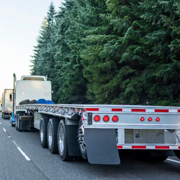 flat deck trailer on hiway